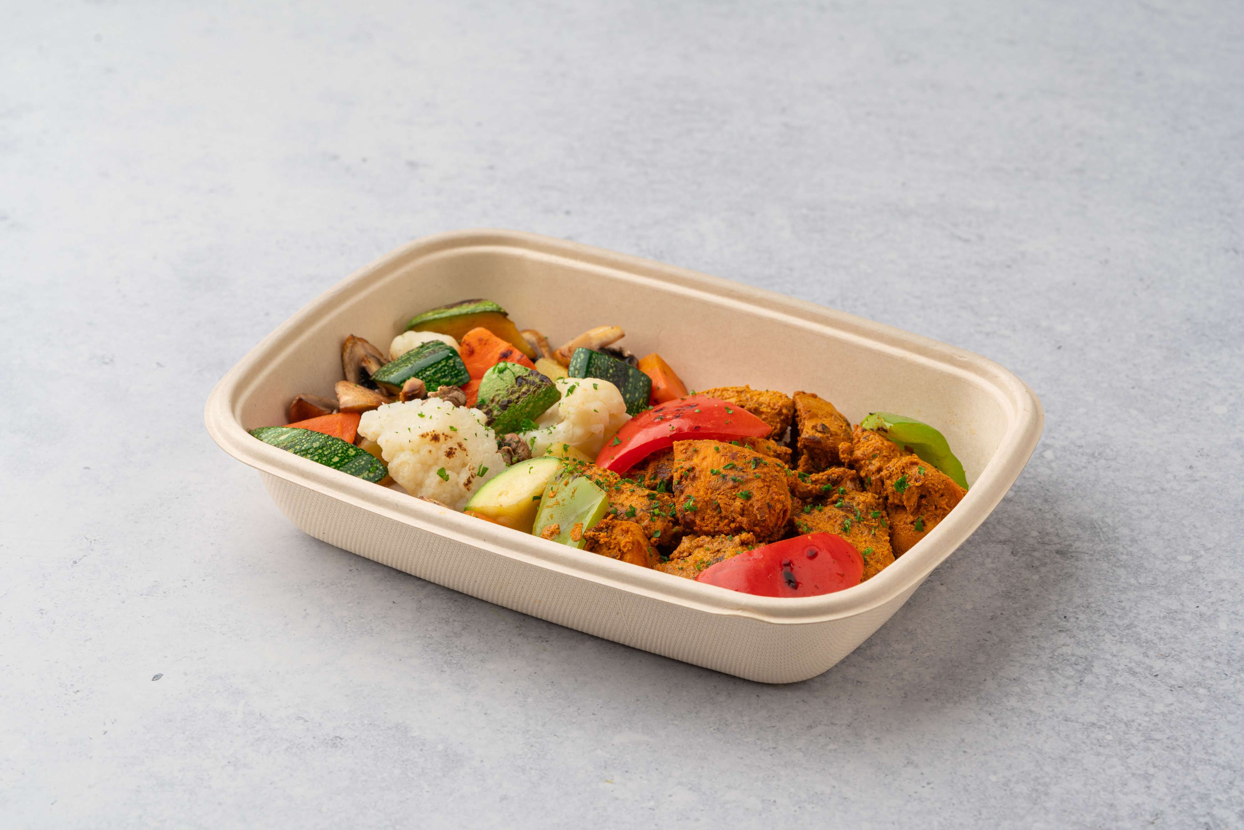 Tandoori Chicken With Sautéed Vegetables Yogurt Sauce And Mint Sauce
